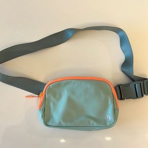 Lulu lemon belt bag brand new condition - unique color combo teal and orange